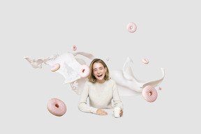 Girl with milk and donuts