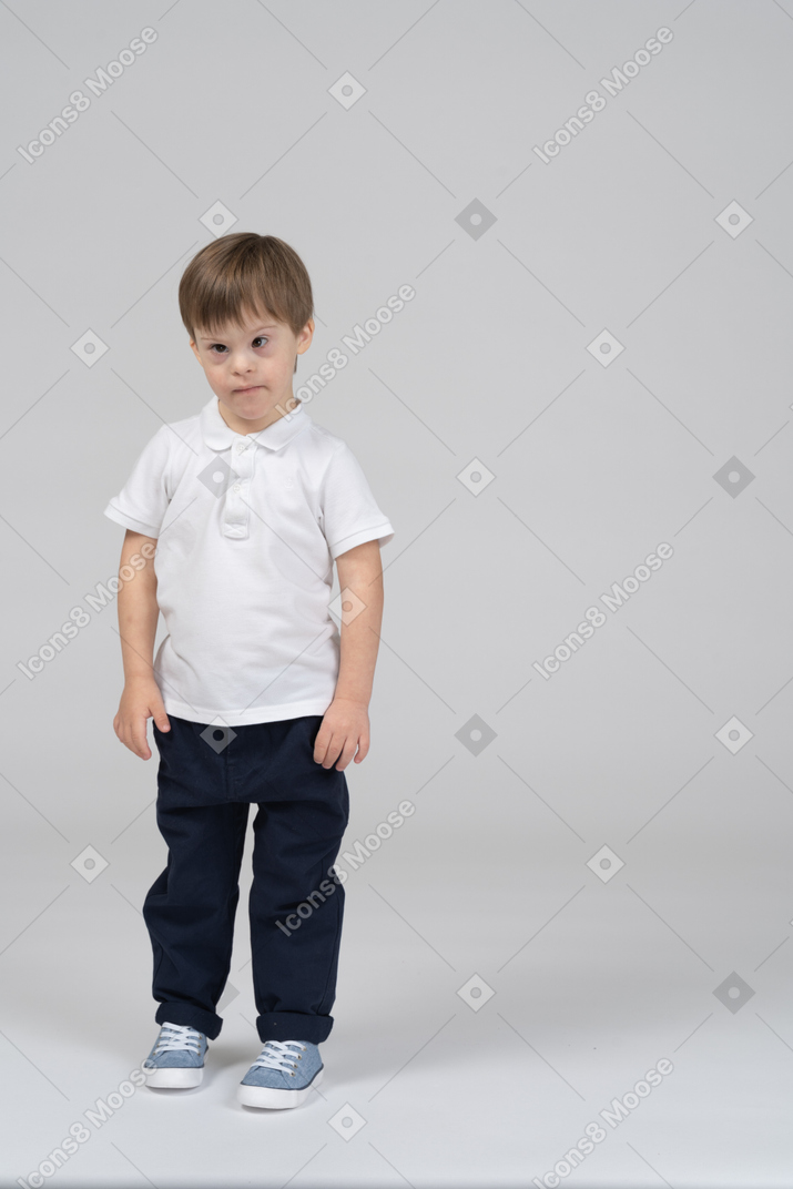 Front view of little boy standing