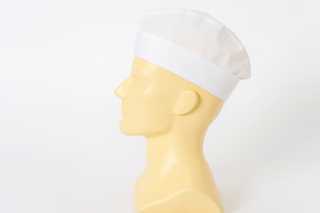 Medical hat on mannequin hat in profile