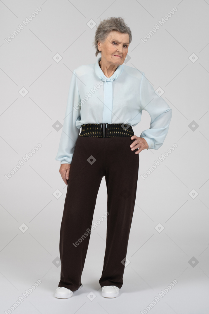 Front view of an old woman squinting suspiciously