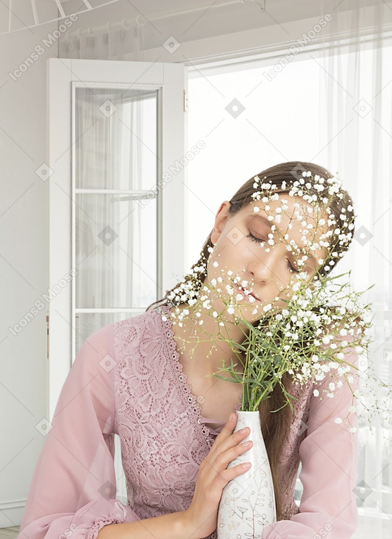 Pregnant woman with a bouquet of flowers