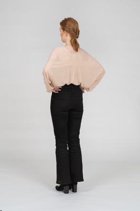 Woman in beautiful blouse standing