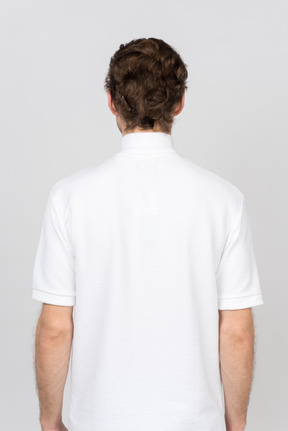 Back view of man in white polo t-shirt