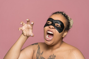 Plump african-american woman scaring others