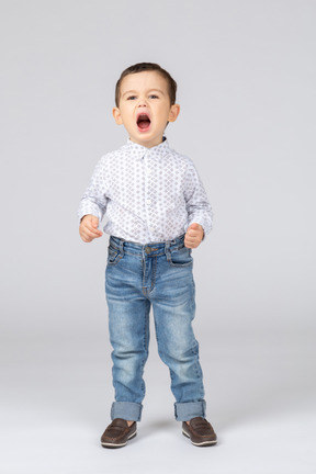 Cute little boy with open mouth
