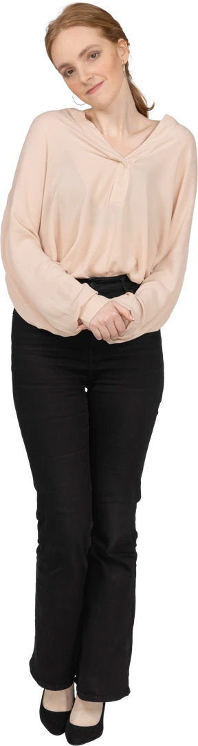 Woman in beautiful blouse standing