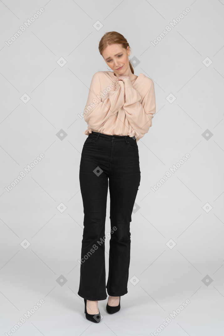 Woman in beautiful blouse standing