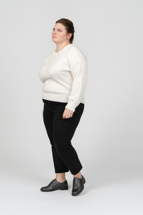 Unhappy plus size woman in casual clothes