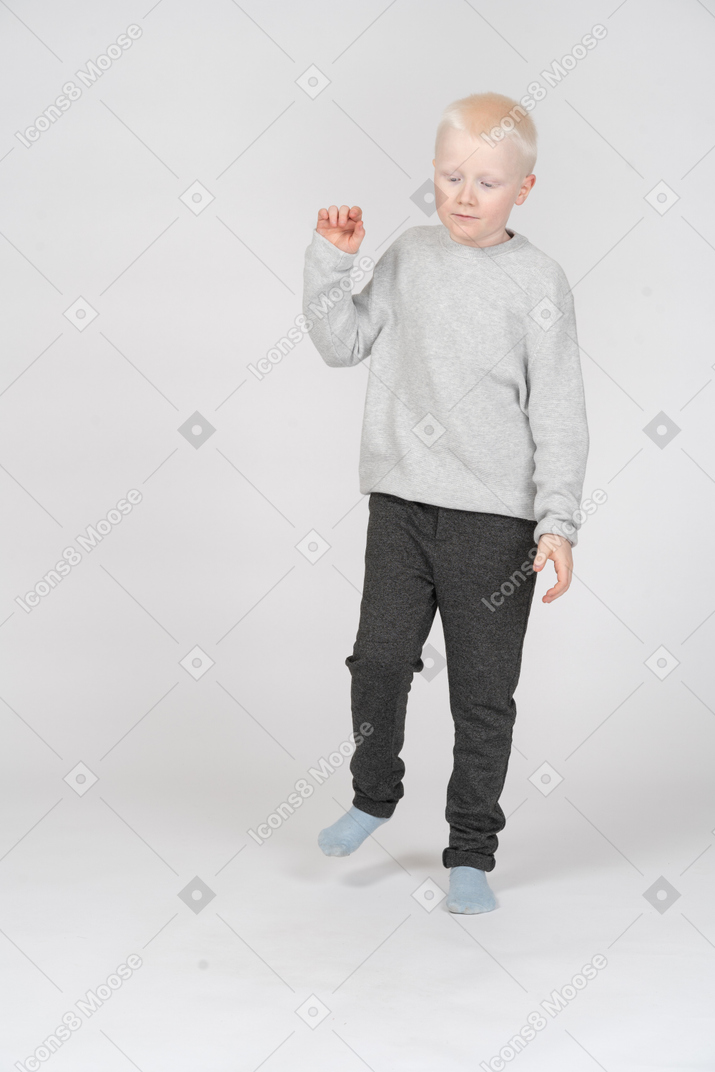 Front view of a boy stepping