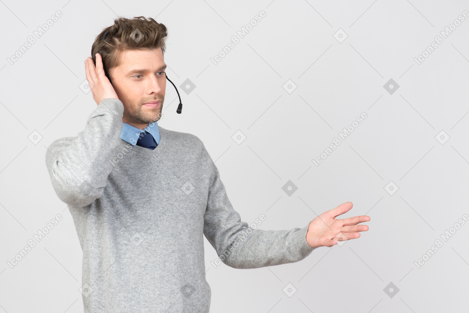 Call center agent touching headset