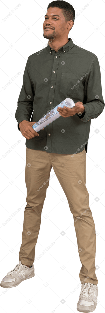 Three-quarter view of a man holding a rolled-up map with a smile