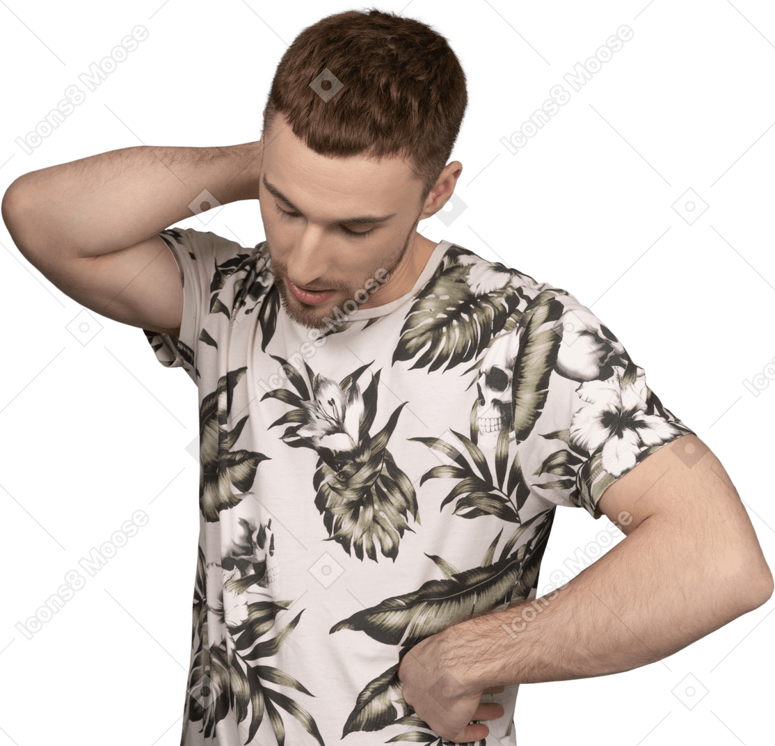 Young caucasian man rubbing neck tiredly in puzzlement