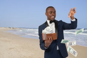 Man throwing money around