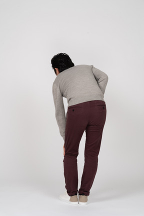 Man in casual clothes posing