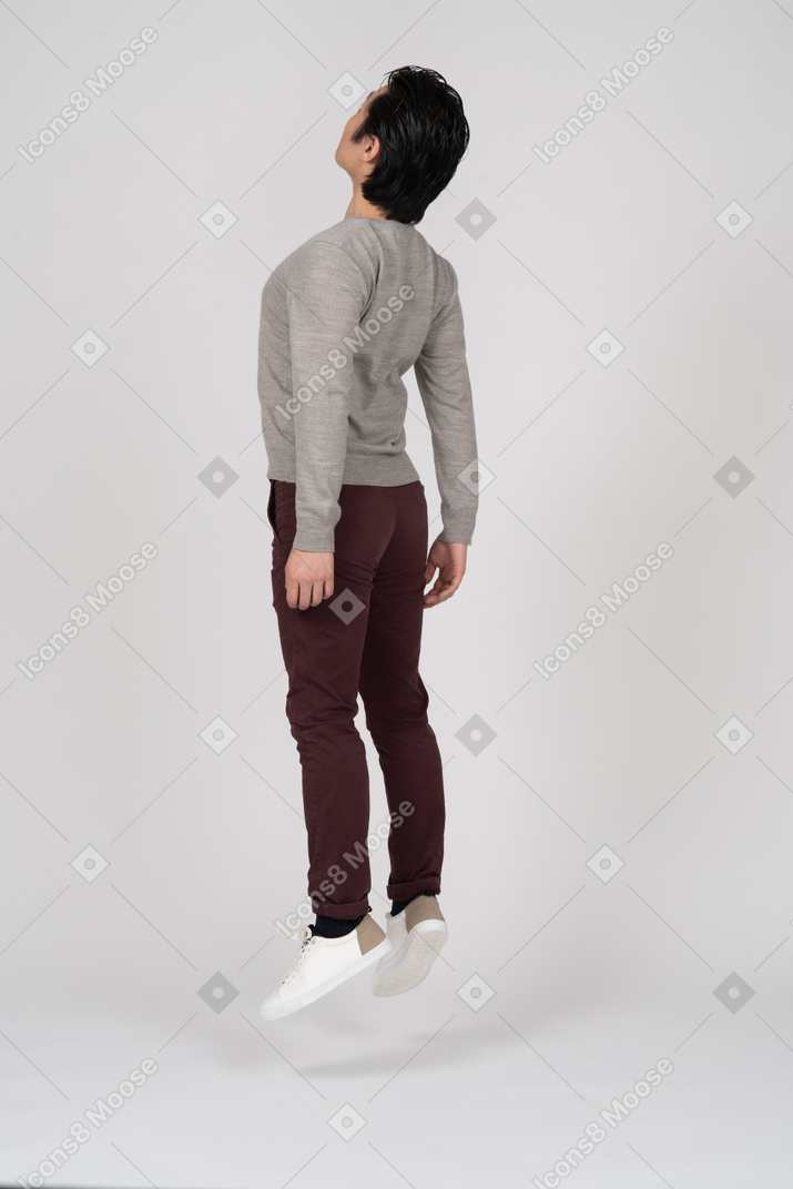 Man in casual clothes jumpung