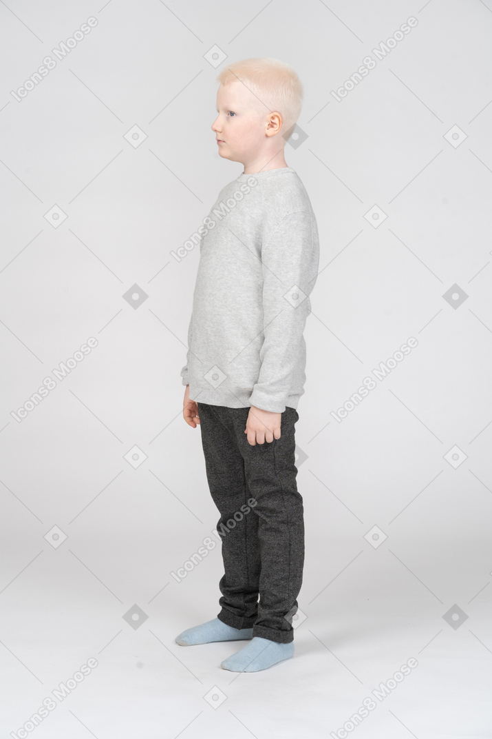 Little boy standing still