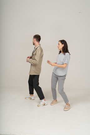 Two young people dancing