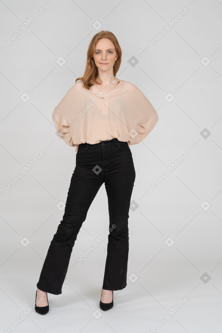 Woman in beautiful blouse standing