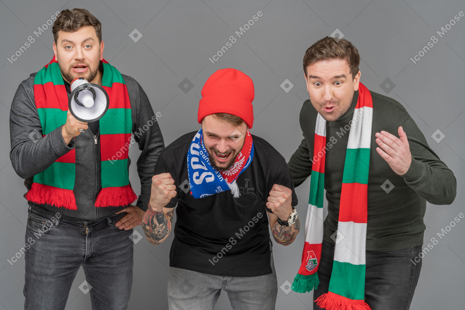 Three football fans watching a game