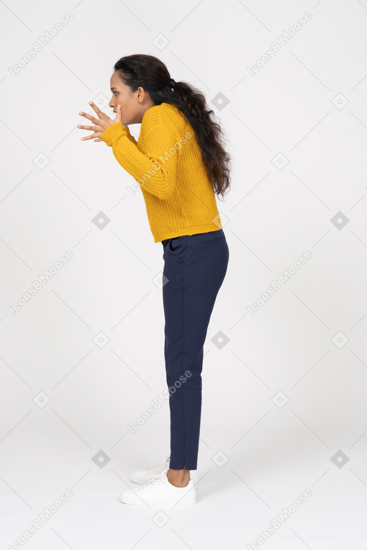 Side view of an angry girl in casual clothes