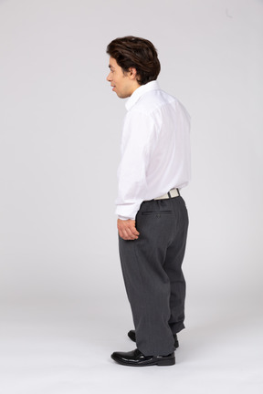 Side view of a man in business casual clothes looking away