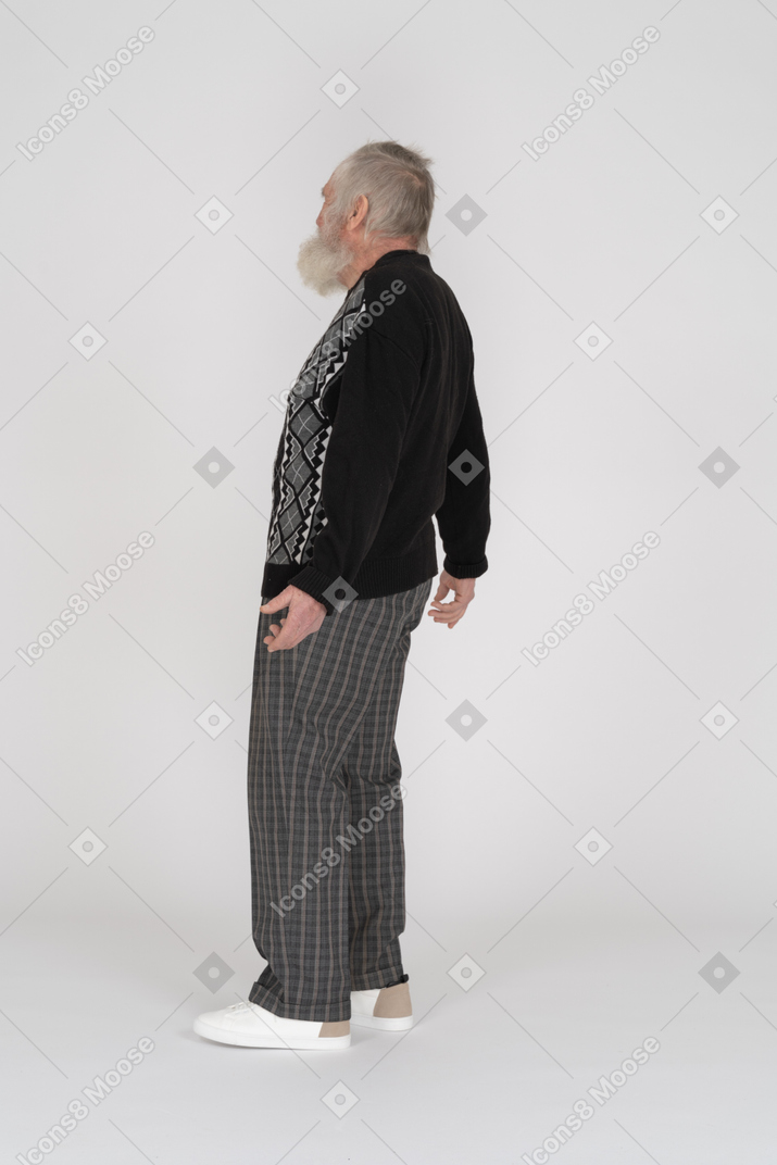Side view of old man slightly leaning back