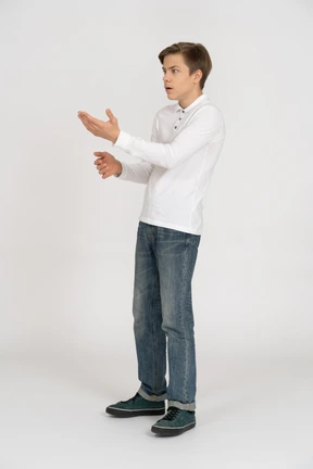 Young man in casual clothes standing