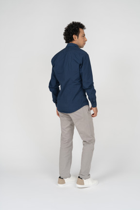 Rear view of a man in casual clothes