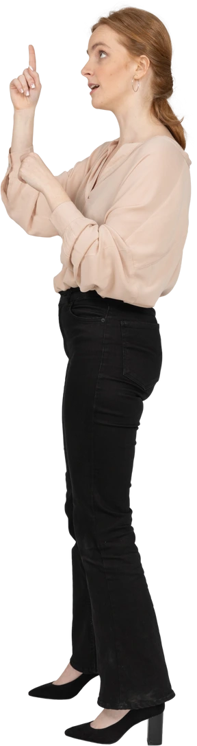Woman in beautiful blouse standing