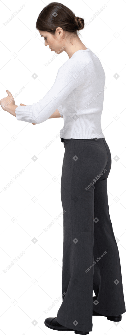 Side view of a woman in casual clothes gesturing