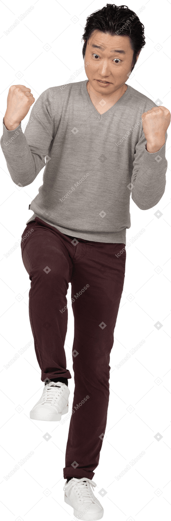 Man in casual clothes posing