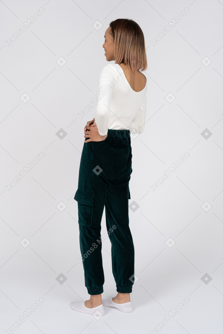 Woman in casual clothes standing