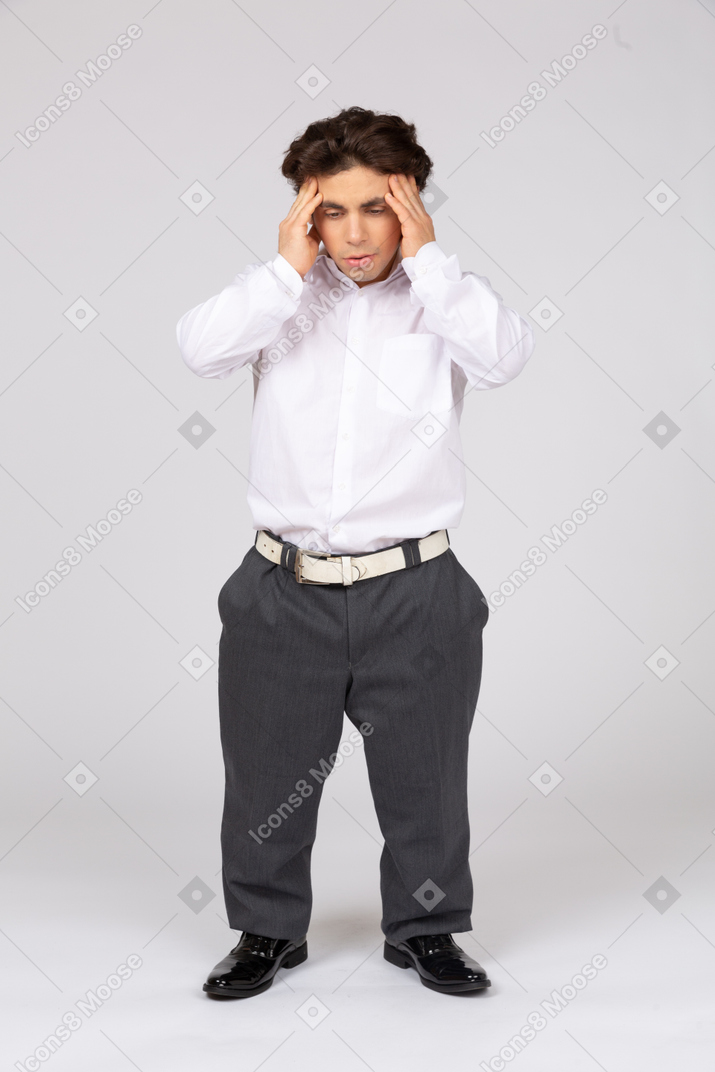 Man touching head and feeling headache