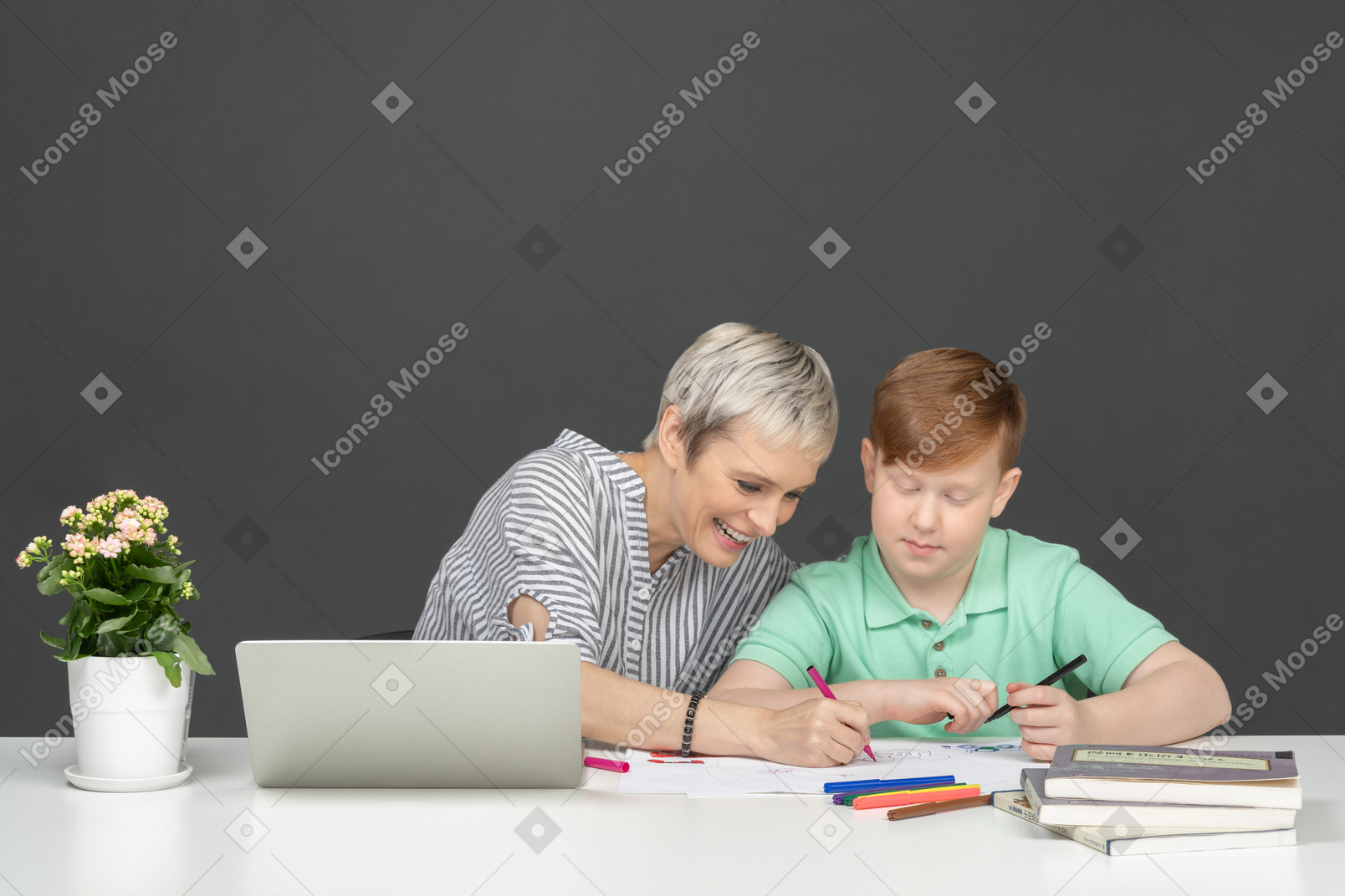 Mother and son doing homework