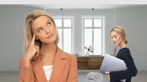 A woman thinking in front of another woman holding a laptop