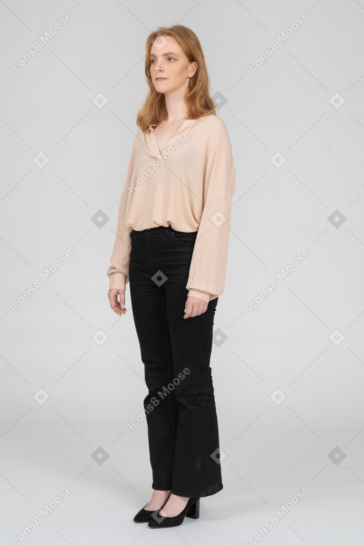 Woman in beautiful blouse standing