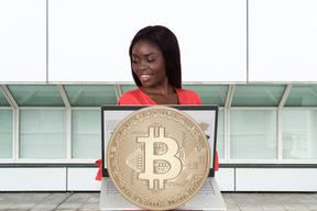 Young woman mining bitcoin