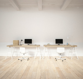 Office space with computer equipment and stationery