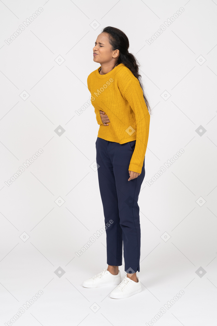 Girl in casual clothes suffering from stomachache