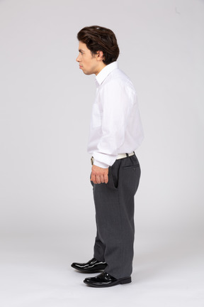 Side view of a man in business casual clothes looking away