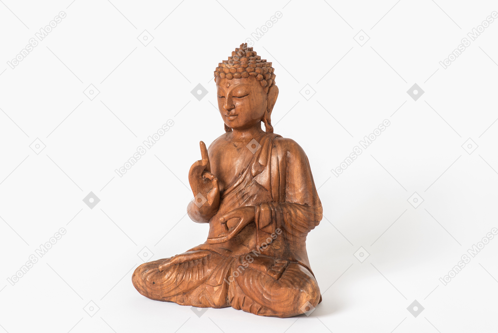 Buddha statue placed half sideways on white background