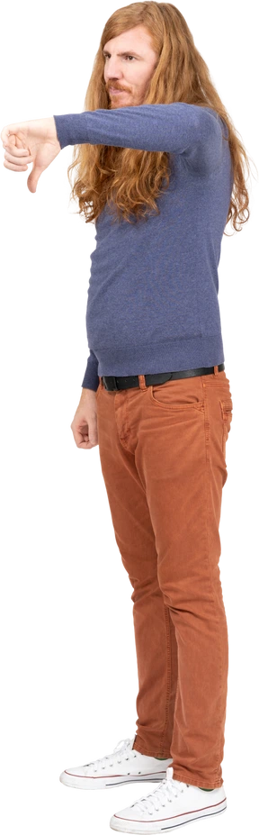 Side view of a young man showing thumb down
