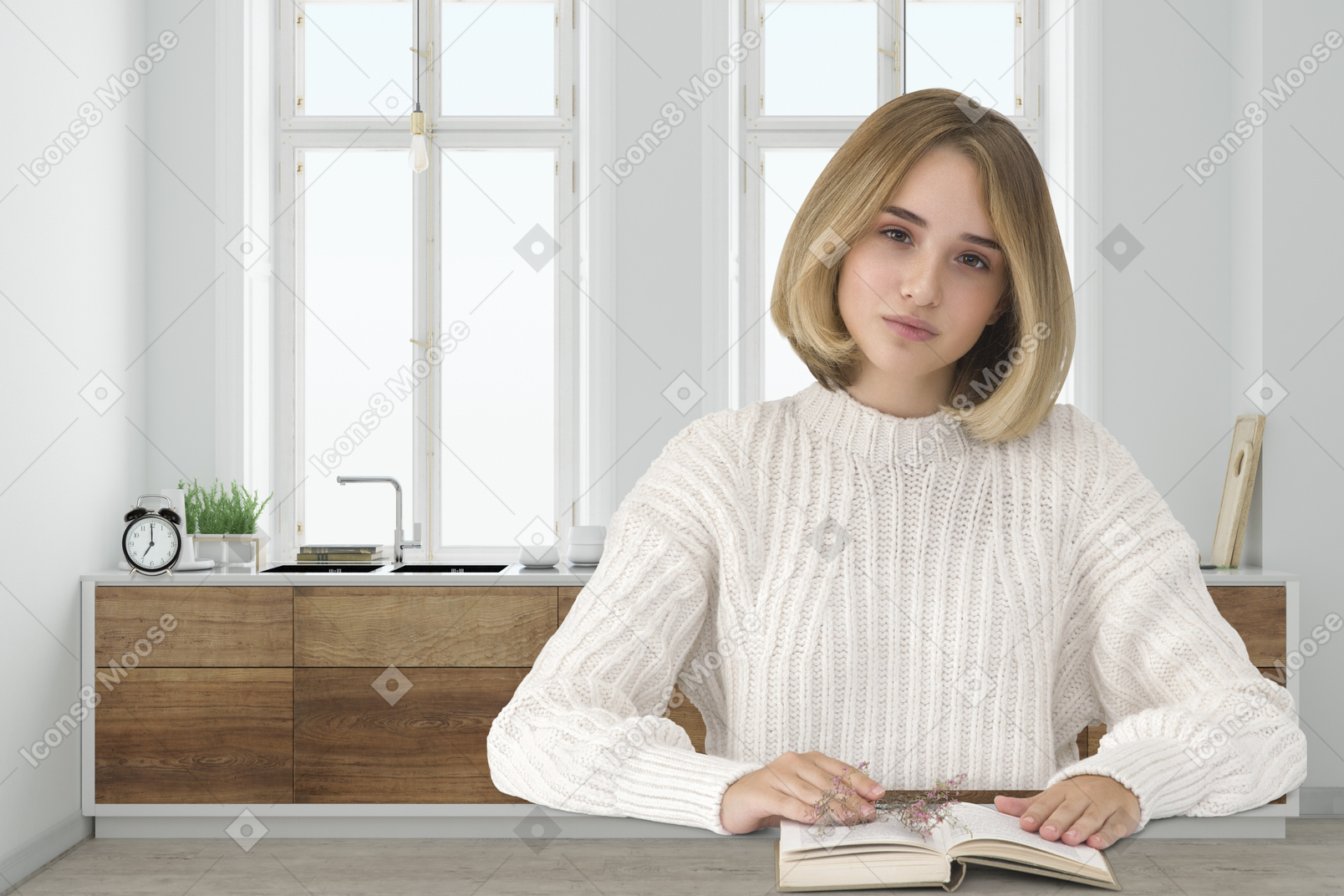 A woman sitting at a table reading a book