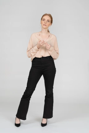 Woman in beautiful blouse standing