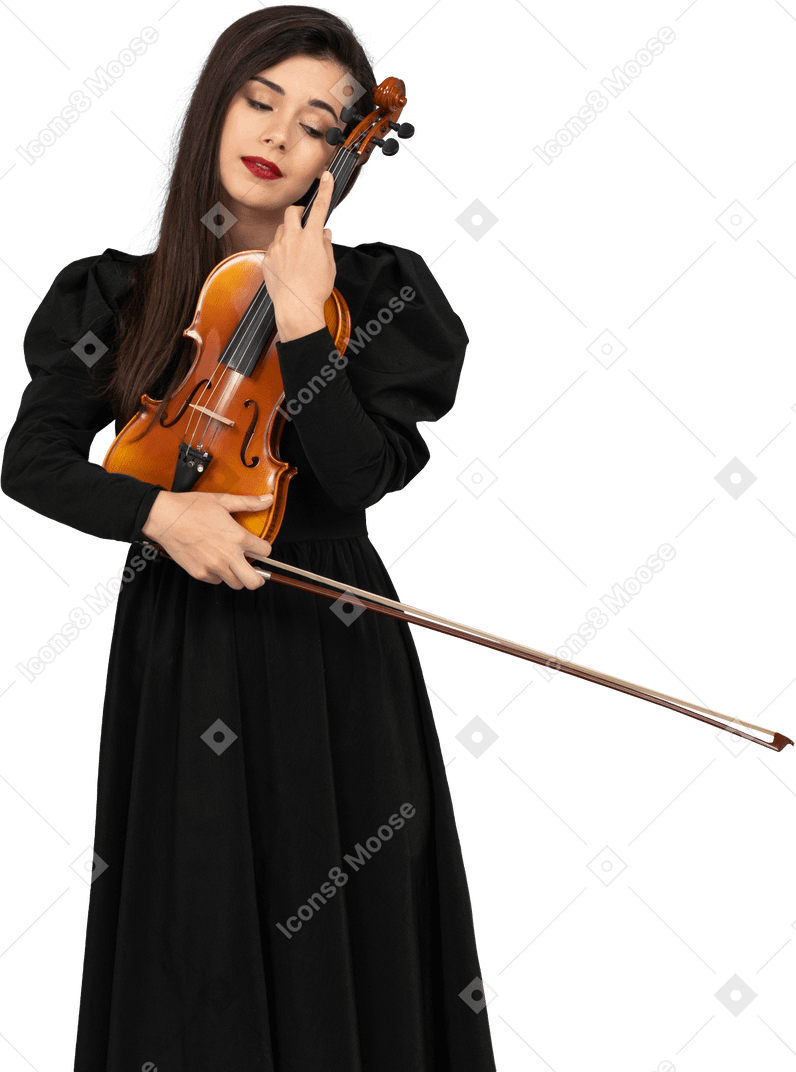 Close-up of a young lady in black dress embracing her violin