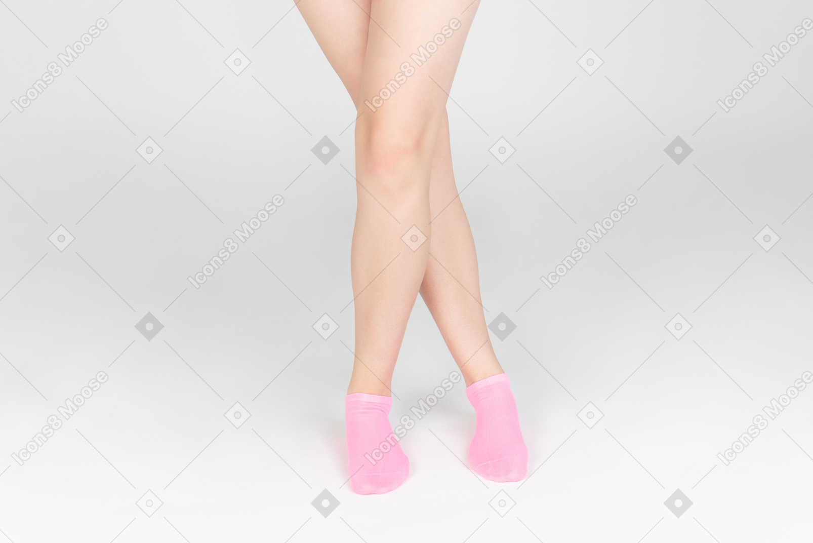 Shot of female legs in pink socks