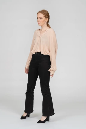 Woman in beautiful blouse standing