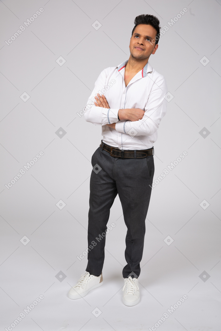 Man in white shirt standing