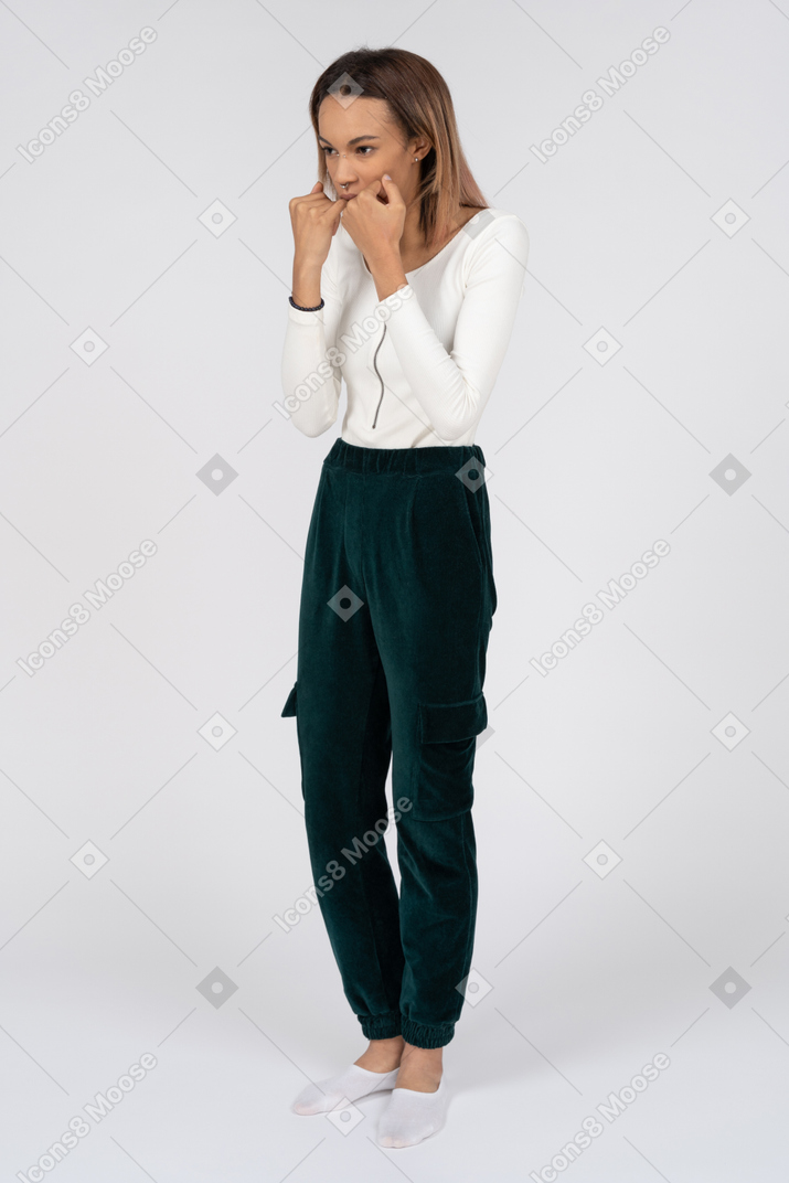 Woman in casual clothes standing