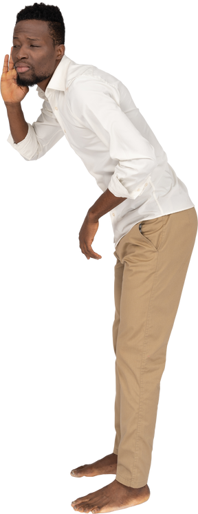 Man in white shirt standing